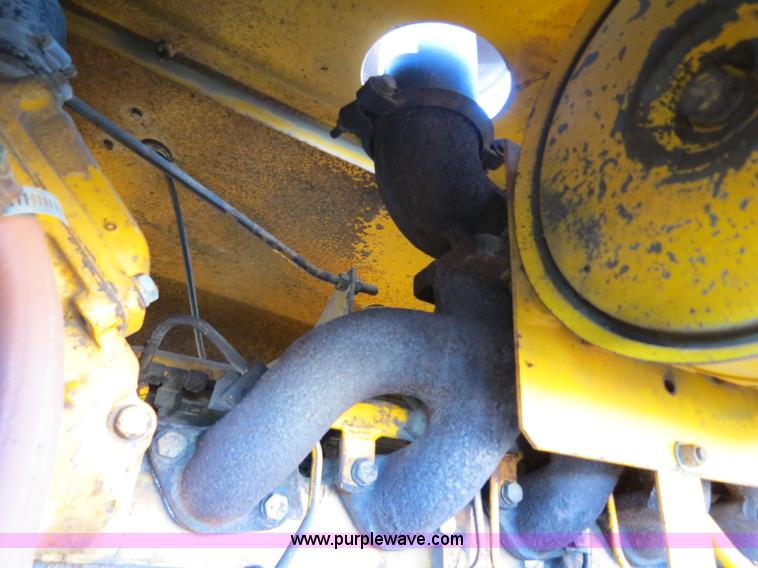 image for item F4353 1980 John Deere 670A articulated motor grader