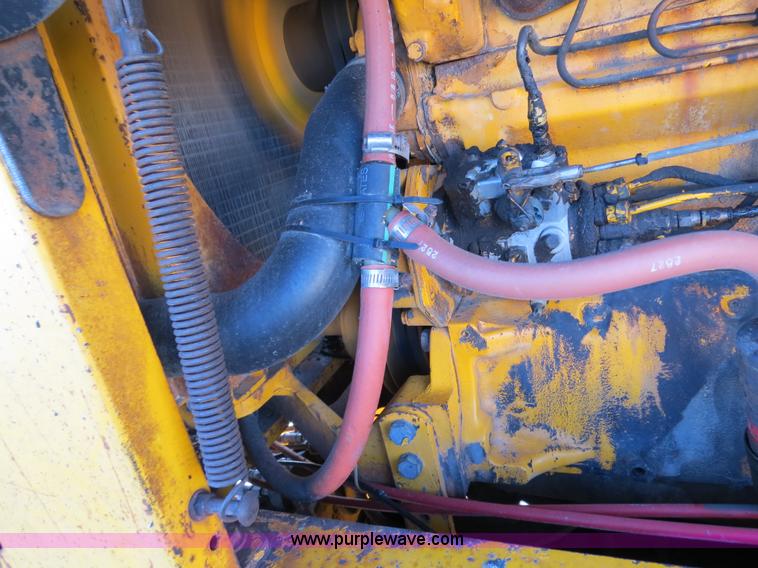 image for item F4353 1980 John Deere 670A articulated motor grader