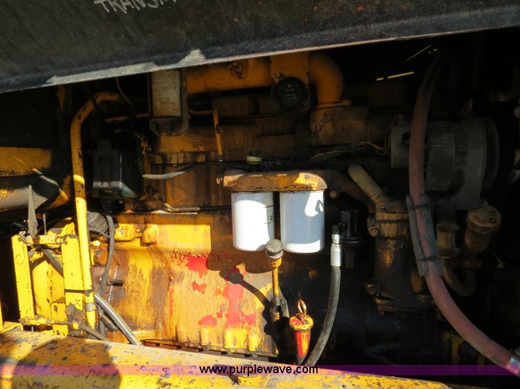 image for item F4353 1980 John Deere 670A articulated motor grader