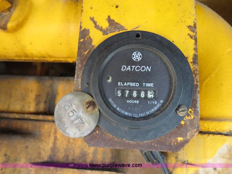 image for item F4353 1980 John Deere 670A articulated motor grader