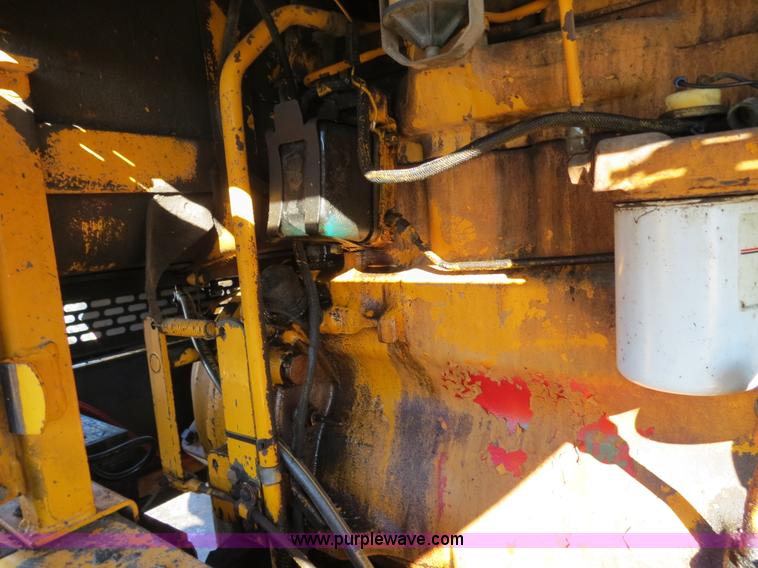 image for item F4353 1980 John Deere 670A articulated motor grader