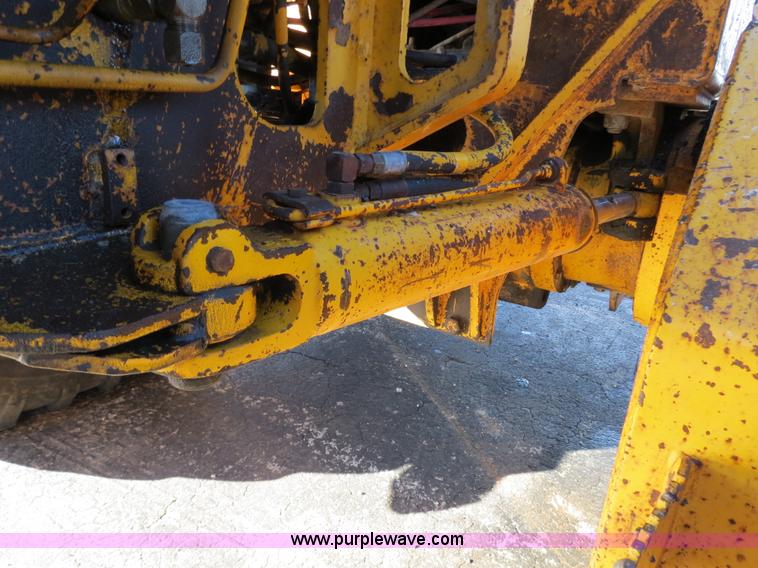 image for item F4353 1980 John Deere 670A articulated motor grader