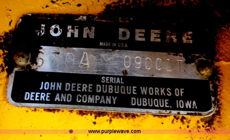 image for item F4353 1980 John Deere 670A articulated motor grader