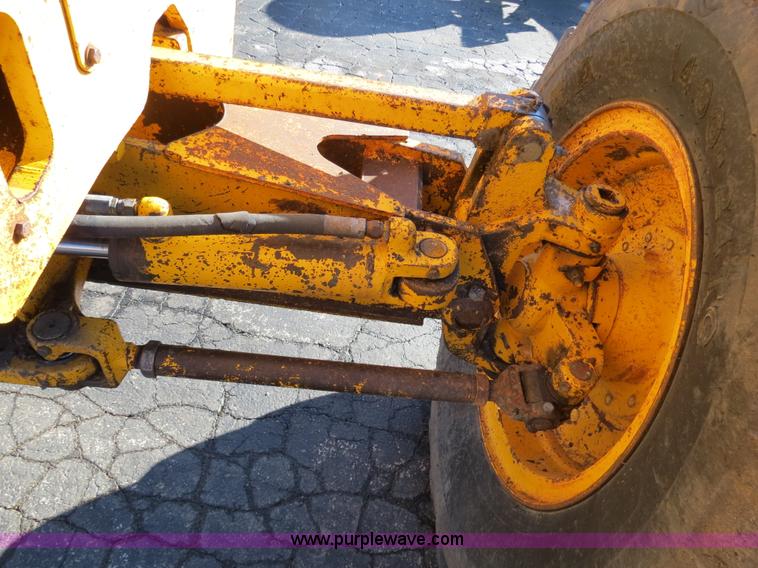 image for item F4353 1980 John Deere 670A articulated motor grader