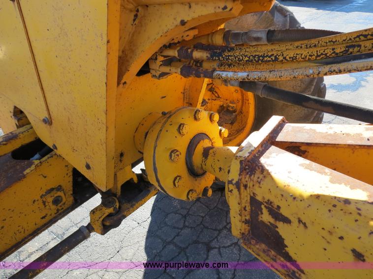 image for item F4353 1980 John Deere 670A articulated motor grader