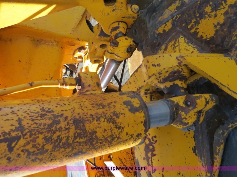 image for item F4353 1980 John Deere 670A articulated motor grader