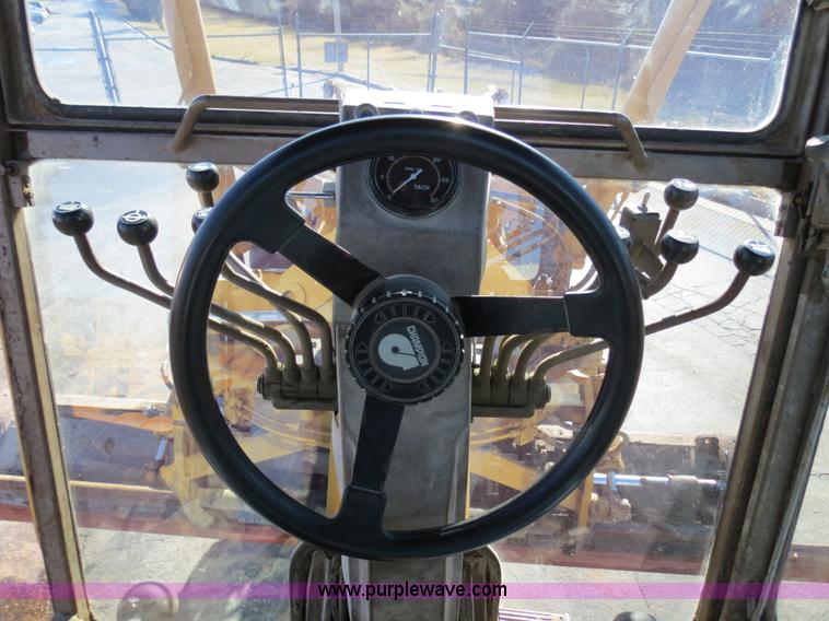 image for item F4355 Champion 720A articulated motor grader