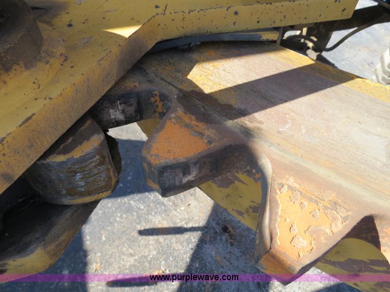 image for item F4355 Champion 720A articulated motor grader