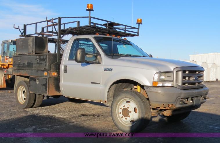 image for item F4365 2002 Ford F450 flatbed truck
