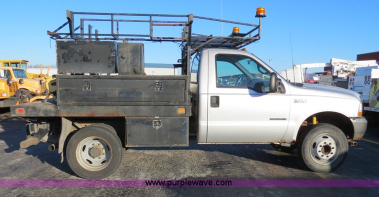 image for item F4365 2002 Ford F450 flatbed truck