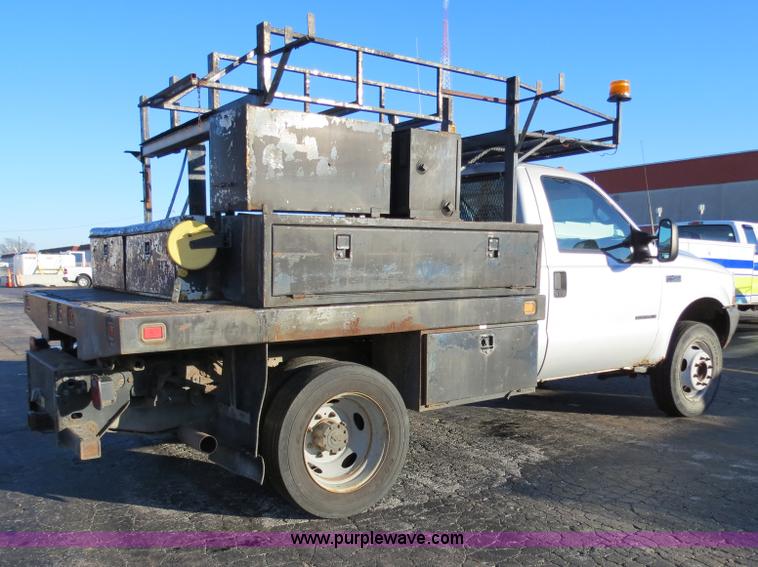 image for item F4365 2002 Ford F450 flatbed truck