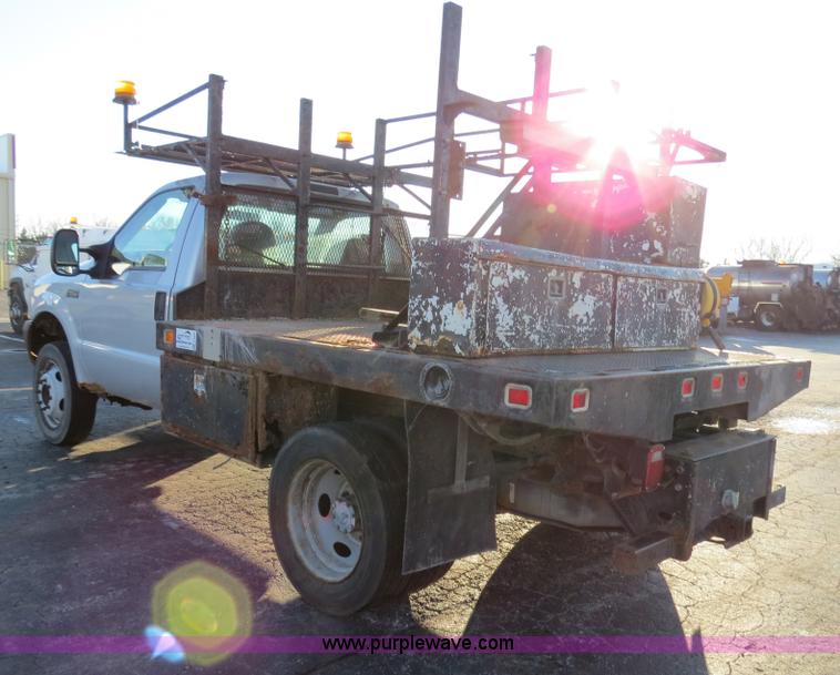 image for item F4365 2002 Ford F450 flatbed truck