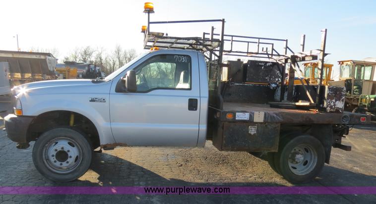 image for item F4365 2002 Ford F450 flatbed truck