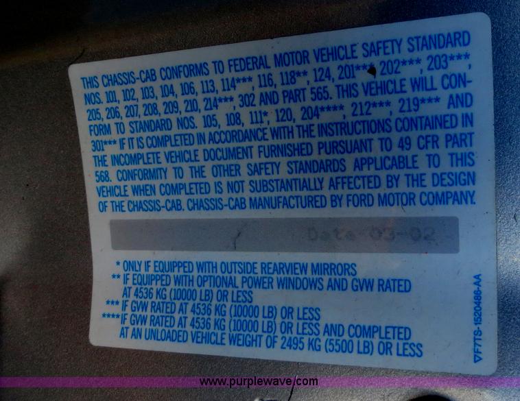 image for item F4365 2002 Ford F450 flatbed truck