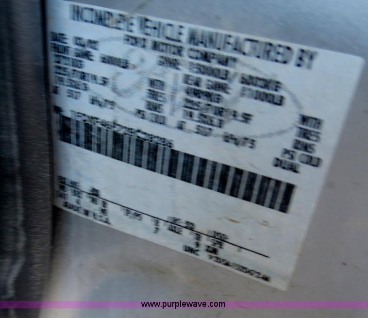 image for item F4365 2002 Ford F450 flatbed truck