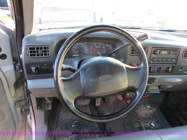 image for item F4365 2002 Ford F450 flatbed truck