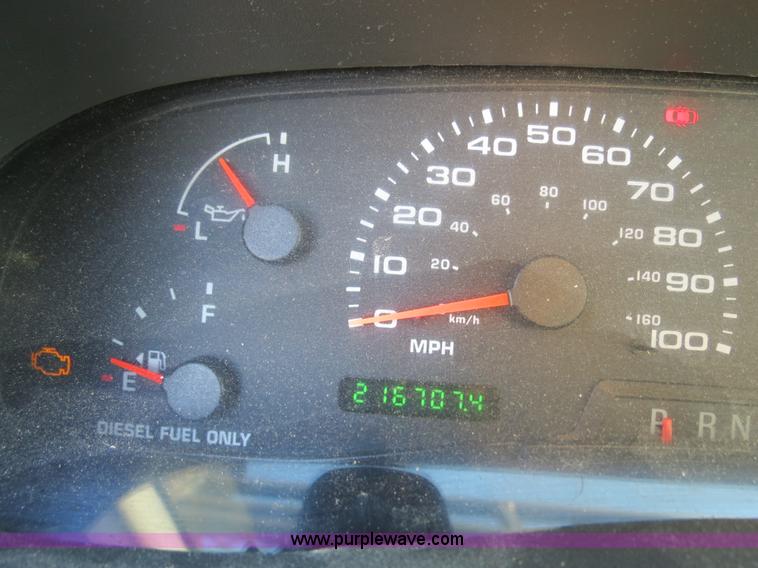 image for item F4365 2002 Ford F450 flatbed truck