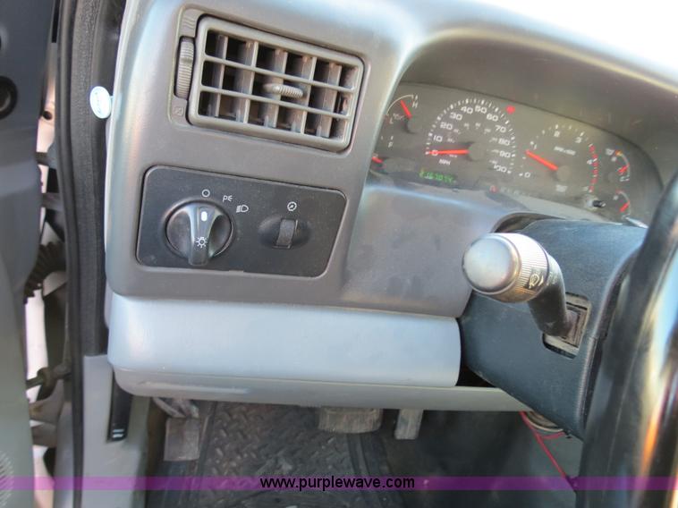 image for item F4365 2002 Ford F450 flatbed truck