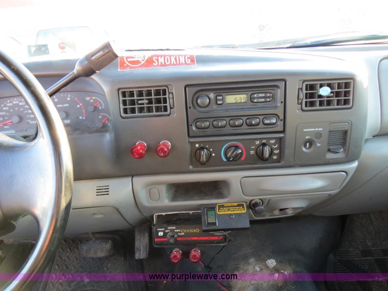 image for item F4365 2002 Ford F450 flatbed truck