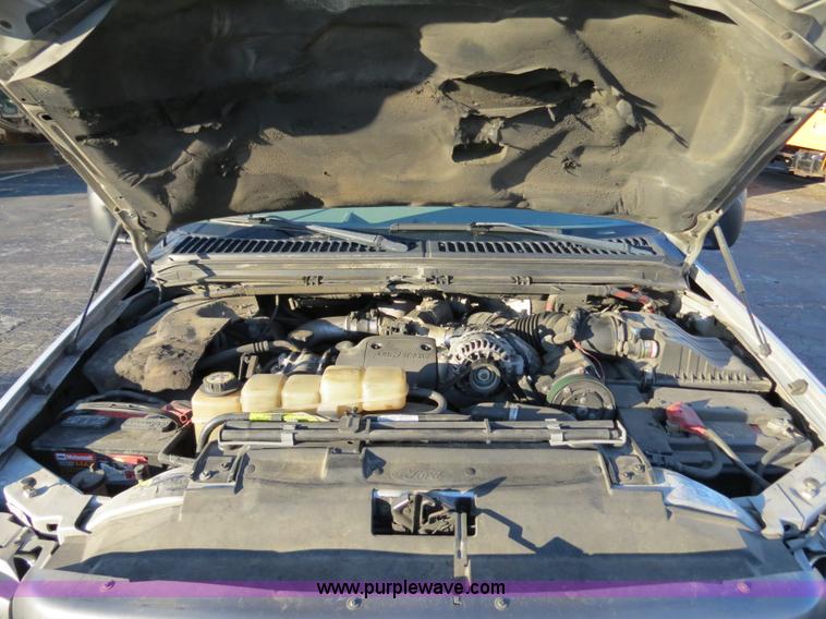 image for item F4365 2002 Ford F450 flatbed truck