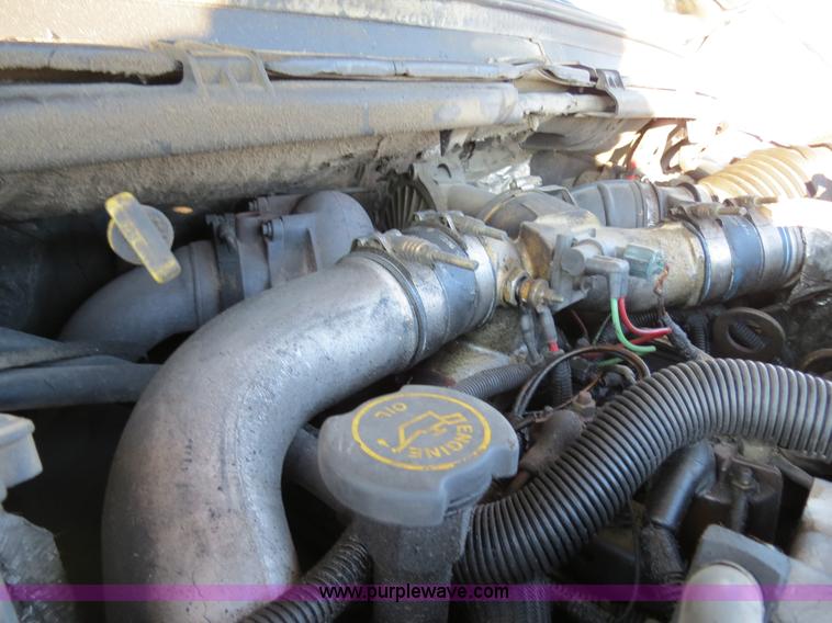 image for item F4365 2002 Ford F450 flatbed truck