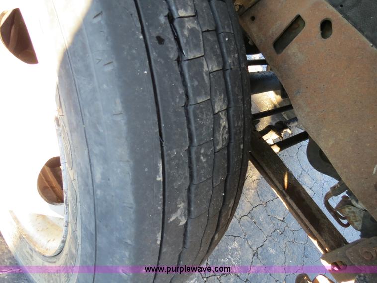 image for item F4365 2002 Ford F450 flatbed truck