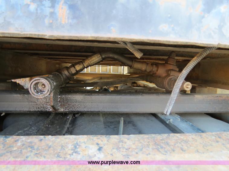 image for item F4365 2002 Ford F450 flatbed truck