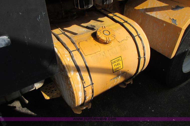 image for item F4803 1996 Ford low tilt cab paint striper truck