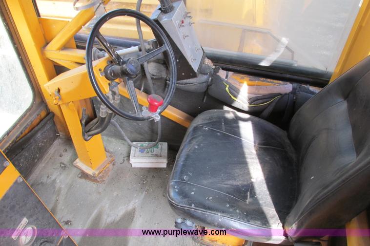 image for item F4803 1996 Ford low tilt cab paint striper truck