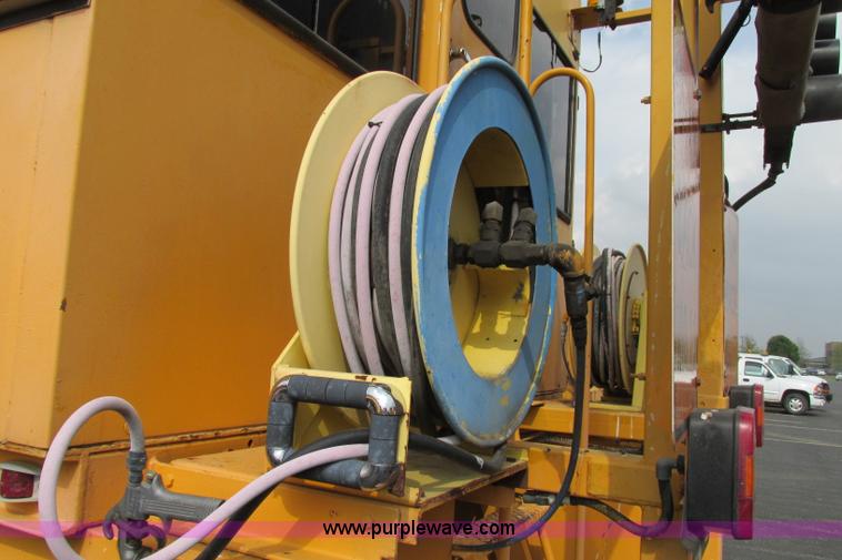 image for item F4803 1996 Ford low tilt cab paint striper truck