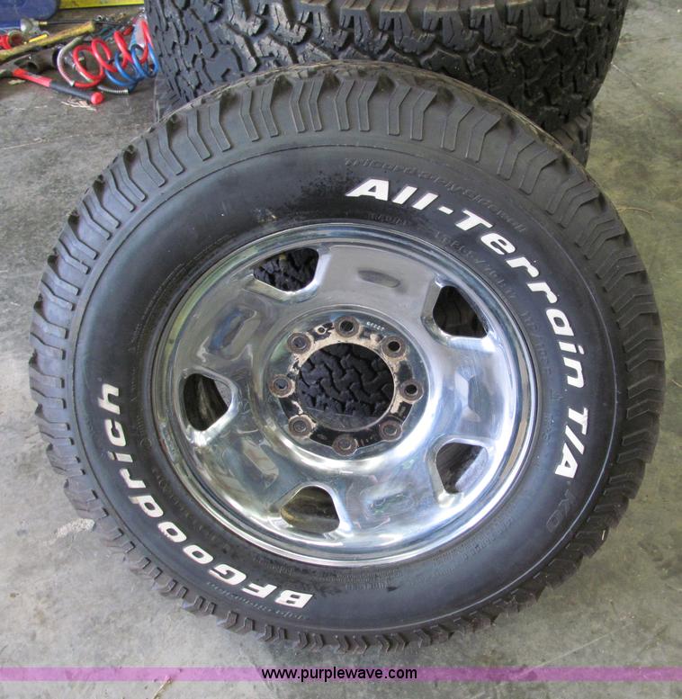 image for item E5990 (4) BF Goodrich wheels and tires