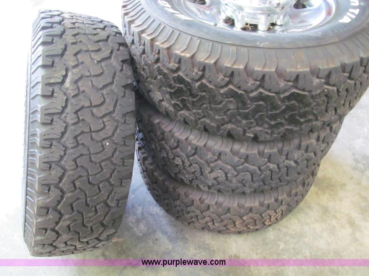 image for item E5990 (4) BF Goodrich wheels and tires