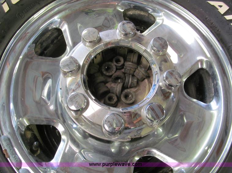 image for item E5990 (4) BF Goodrich wheels and tires