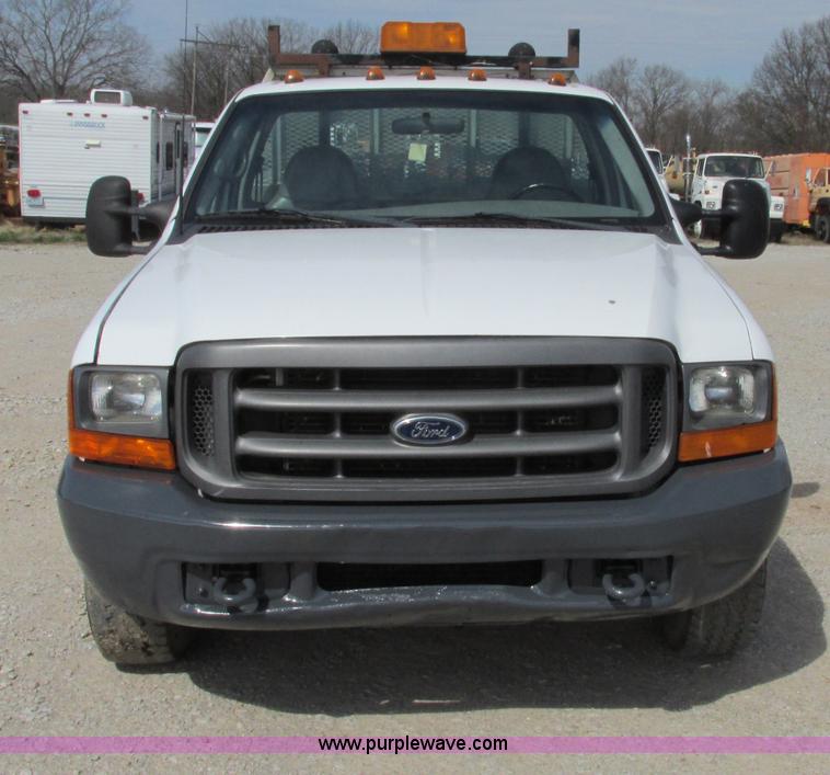 image for item F4798 2001 Ford F350 Super Duty flatbed pickup truck