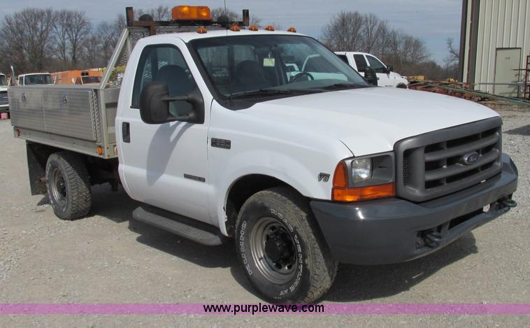 image for item F4798 2001 Ford F350 Super Duty flatbed pickup truck