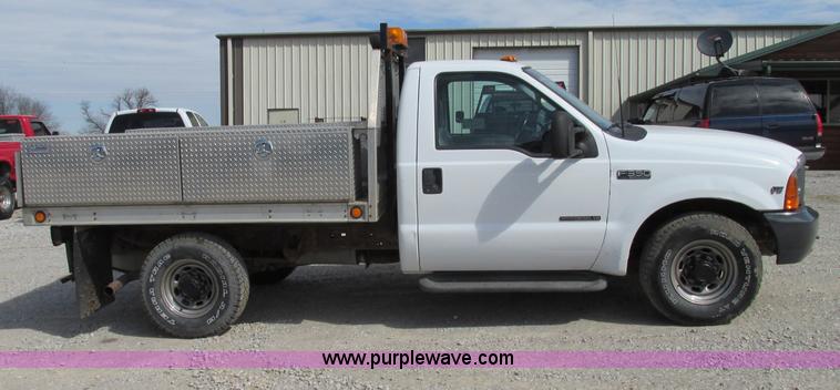 image for item F4798 2001 Ford F350 Super Duty flatbed pickup truck