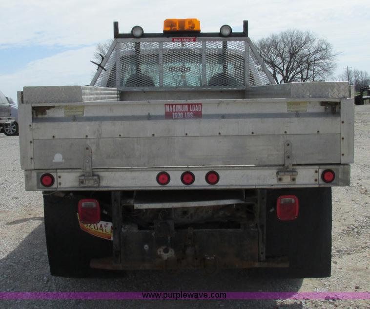 image for item F4798 2001 Ford F350 Super Duty flatbed pickup truck