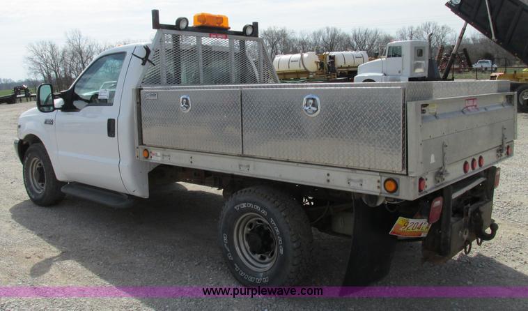 image for item F4798 2001 Ford F350 Super Duty flatbed pickup truck