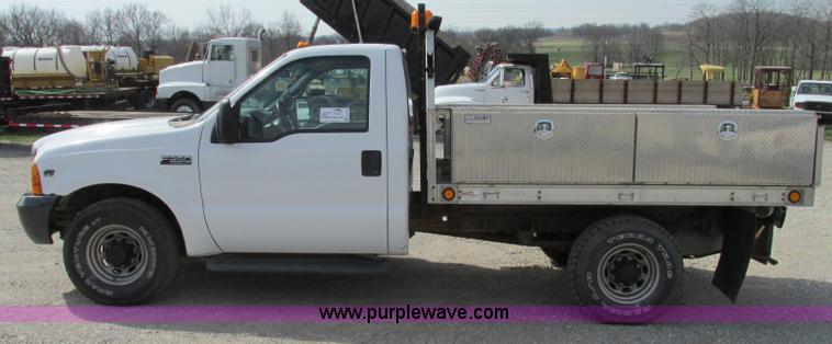 image for item F4798 2001 Ford F350 Super Duty flatbed pickup truck