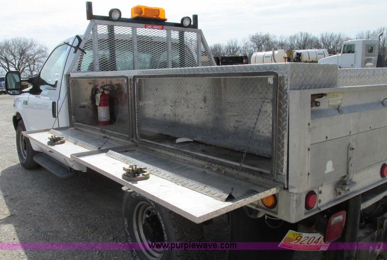 image for item F4798 2001 Ford F350 Super Duty flatbed pickup truck