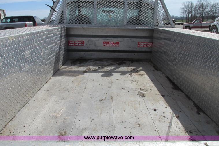 image for item F4798 2001 Ford F350 Super Duty flatbed pickup truck