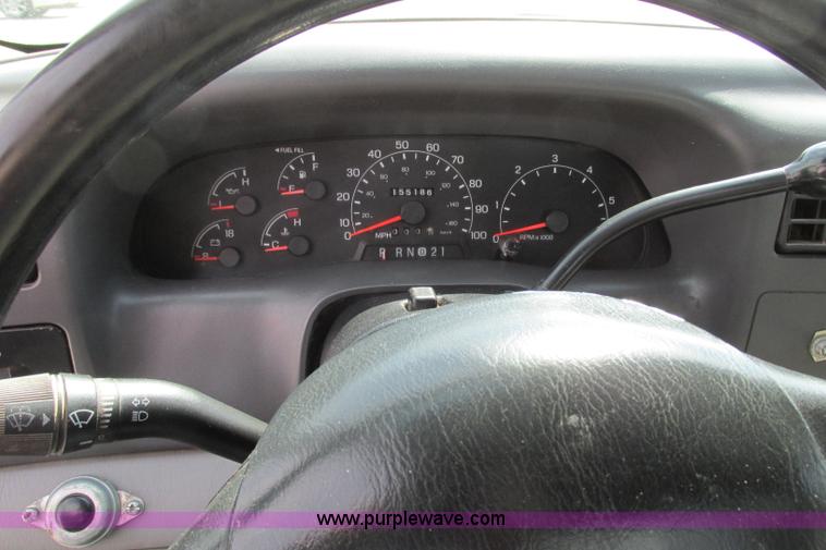 image for item F4798 2001 Ford F350 Super Duty flatbed pickup truck