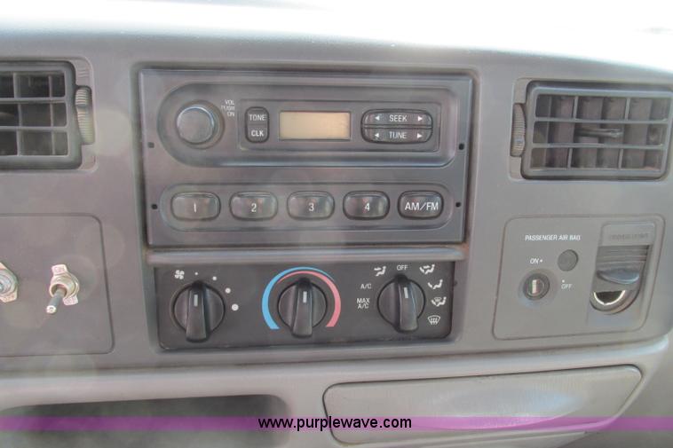 image for item F4798 2001 Ford F350 Super Duty flatbed pickup truck