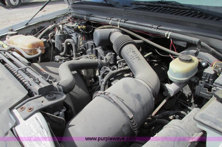 image for item F4798 2001 Ford F350 Super Duty flatbed pickup truck