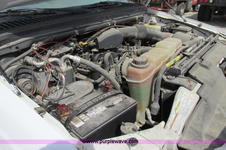 image for item F4798 2001 Ford F350 Super Duty flatbed pickup truck