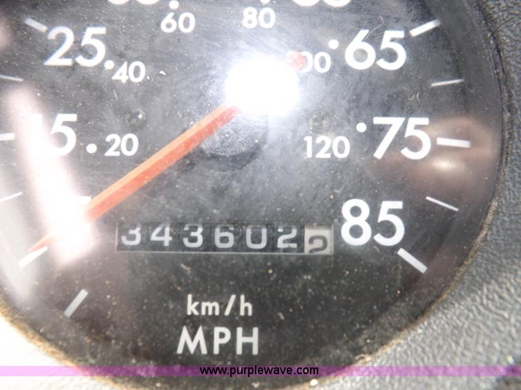 image for item F6492 2000 Freightliner FL60 semi truck