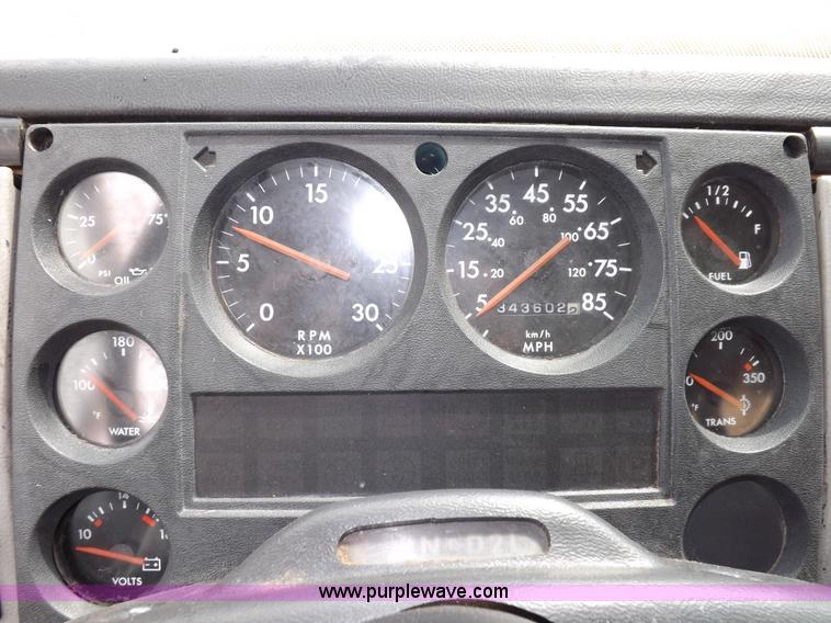 image for item F6492 2000 Freightliner FL60 semi truck