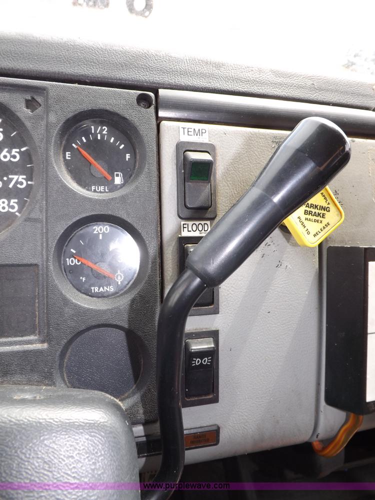 image for item F6492 2000 Freightliner FL60 semi truck