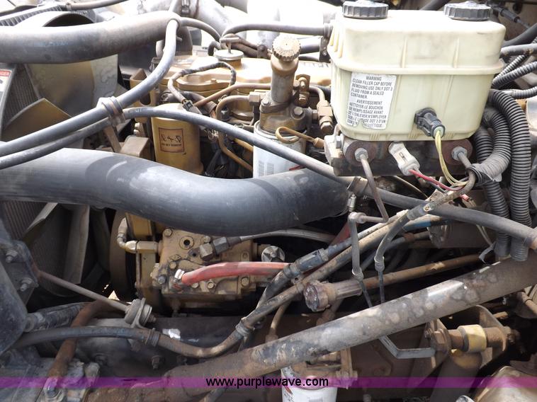 image for item F6492 2000 Freightliner FL60 semi truck