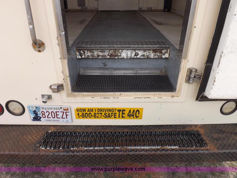 image for item F6492 2000 Freightliner FL60 semi truck